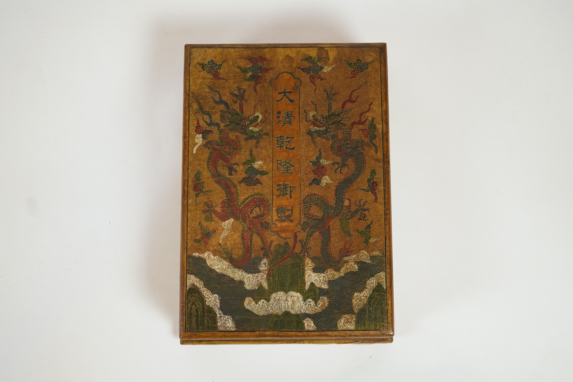 A Chinese inscribed polychrome lacquer document box, Qianlong mark and inscription